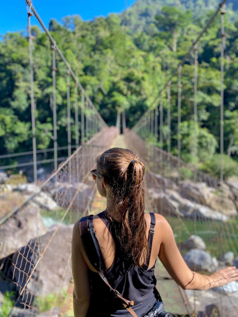 Sarah on Pico Bonito National Park bridge