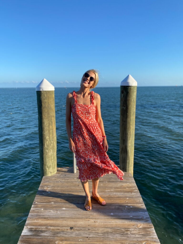 Mary on dock by ocean at Postcard Inn in islamorada