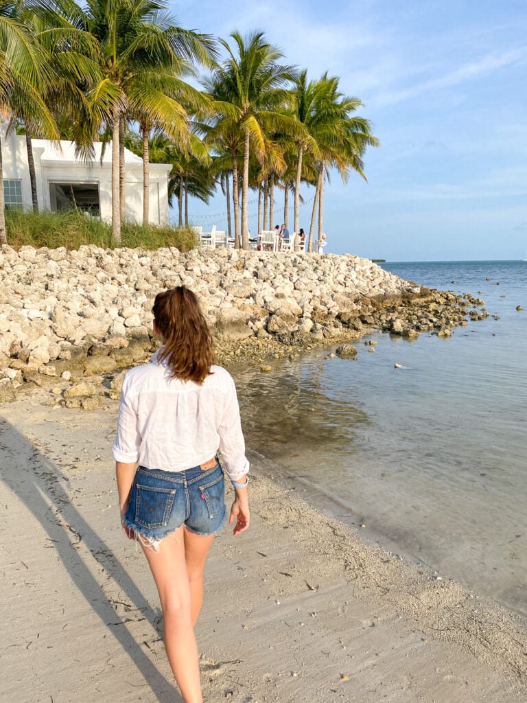 Sarah on beach at isla bella beach resort in marathon florida keys