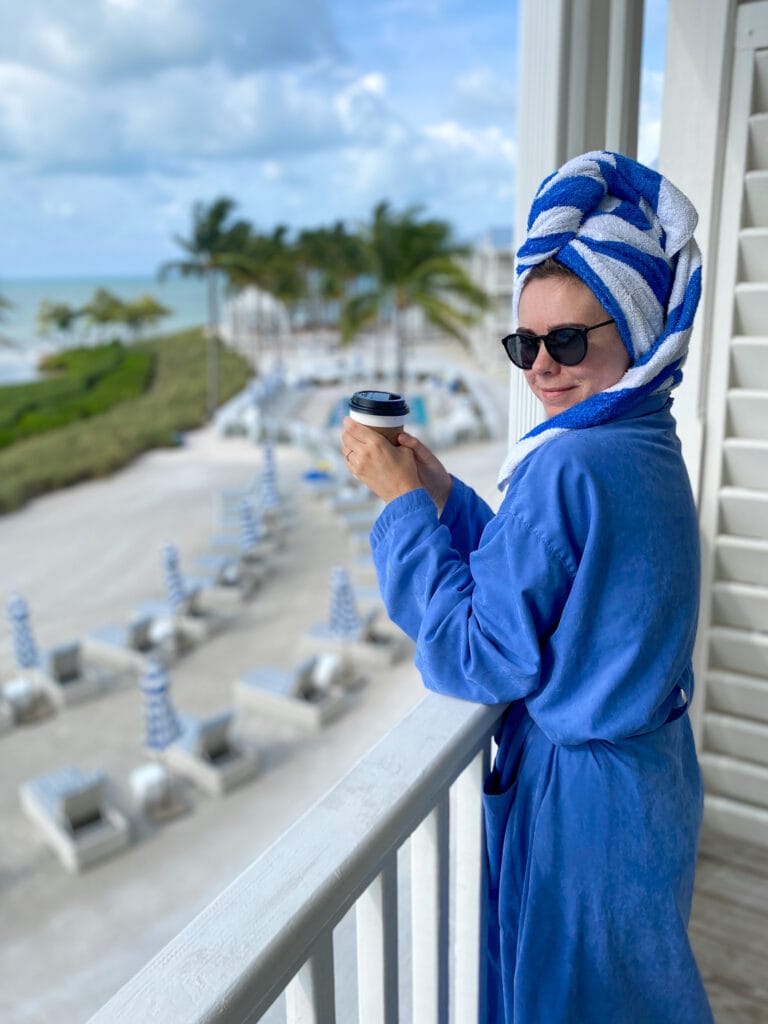 Sarah with towel on head on balcony of Islabella hotel