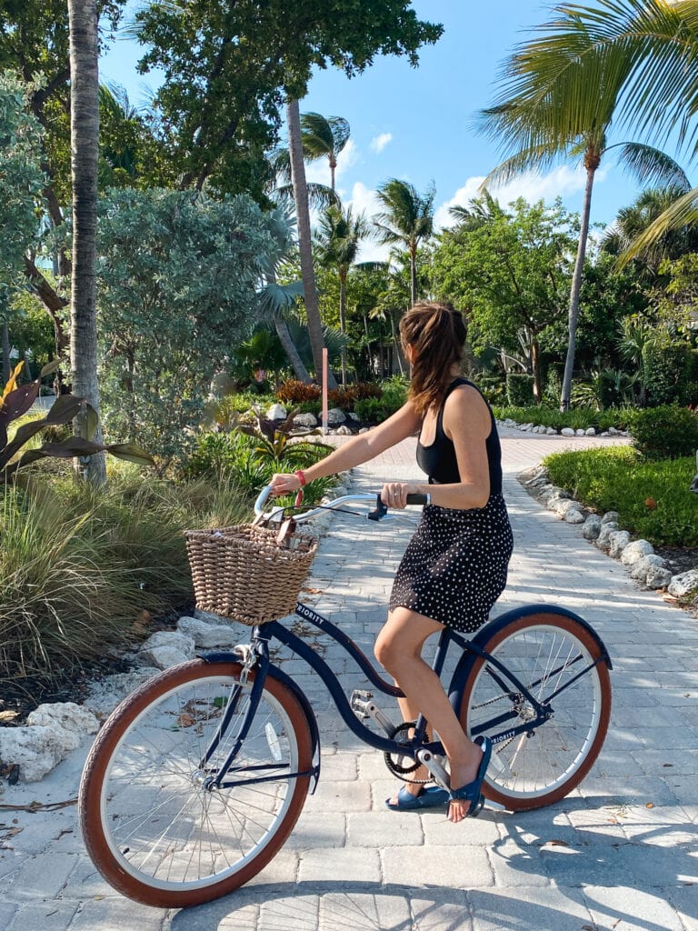 Sarah on bike at postcard inn