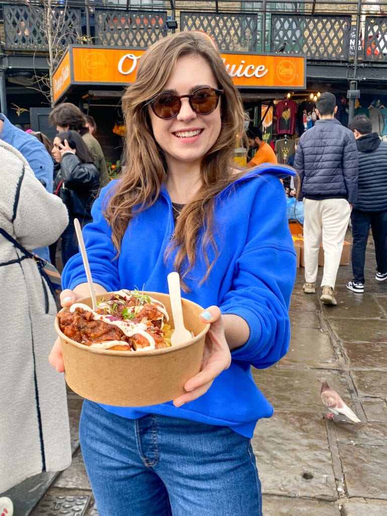 Sarah holding gluten free fried chicken at camden market