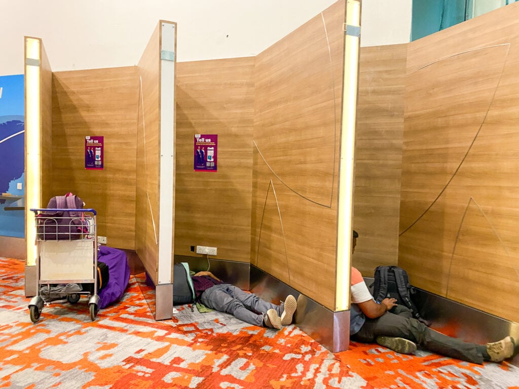 People sleeping at Kuala Lumpur Airport