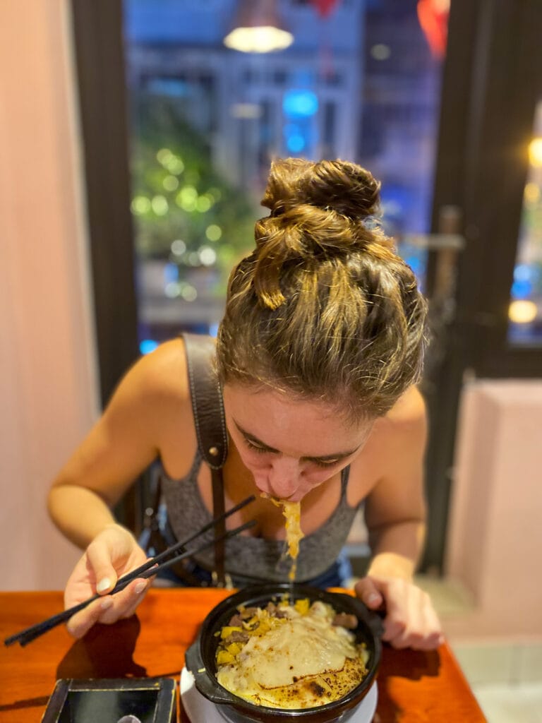 Sarah eating at Hong Hoai's Restaurant in Hanoi