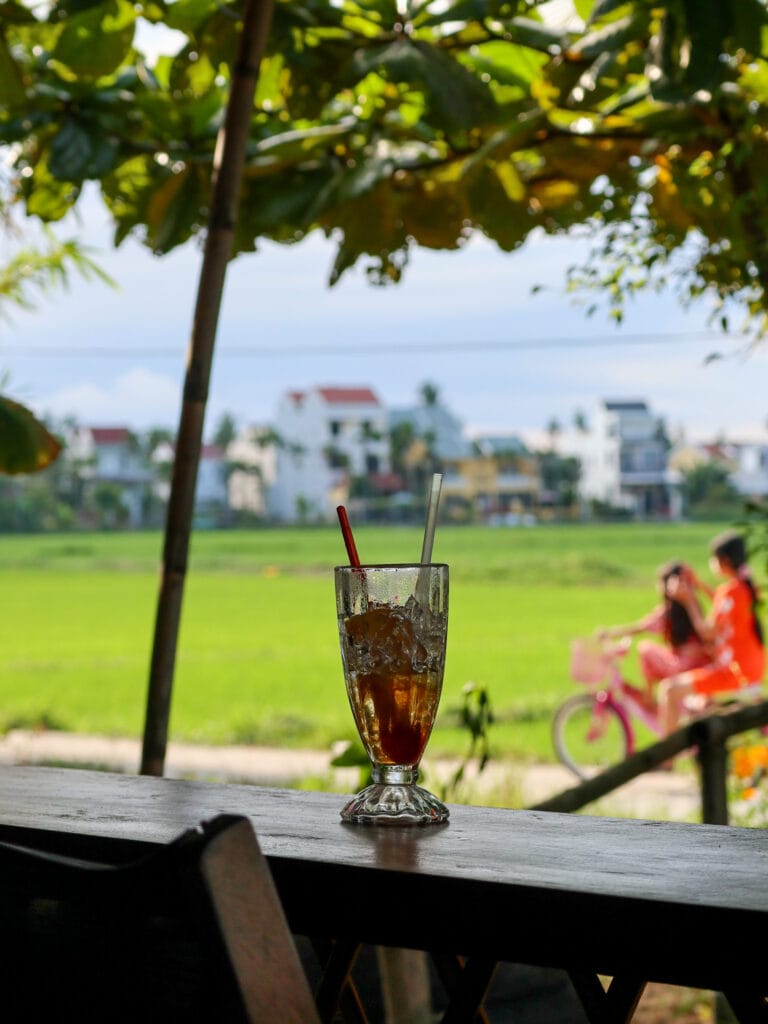 iced tea in the rice fields in hoi an vietnam