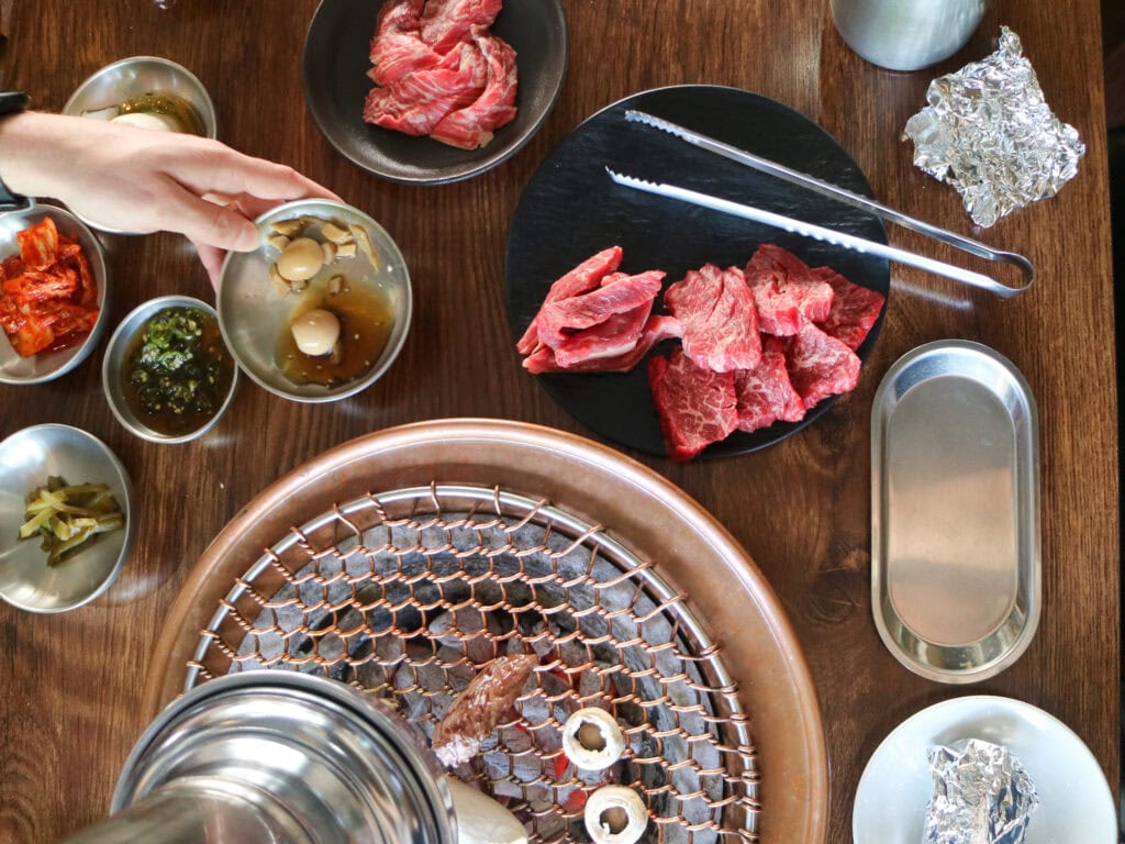overhead shot of a table of KBBQ.