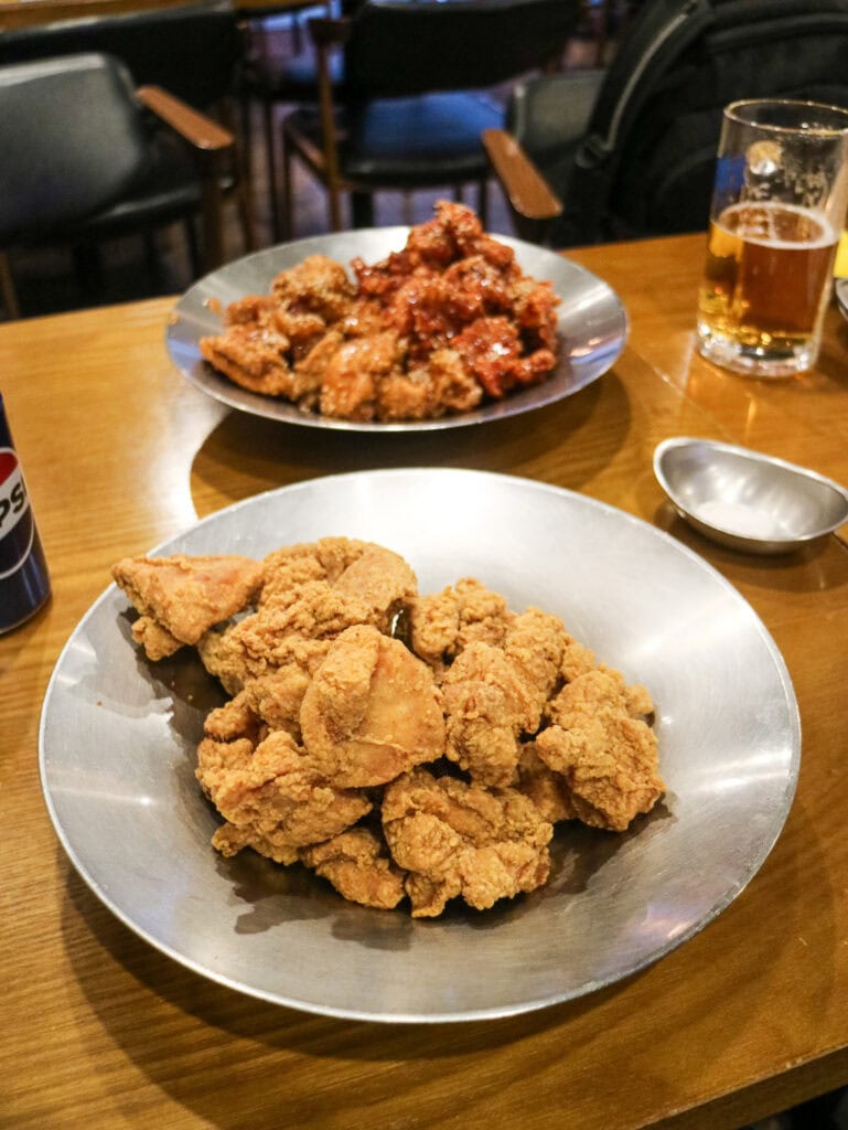 metal bowl of fried chicken
