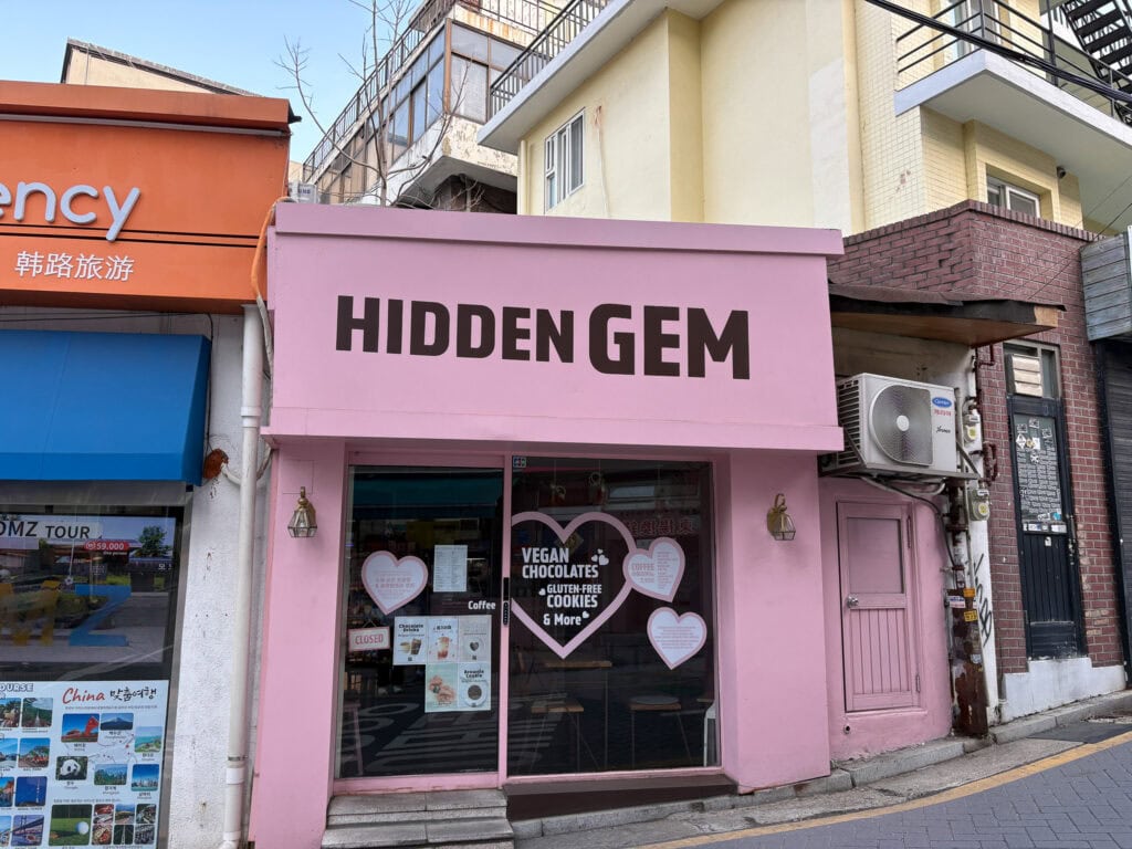 Pink building that says "Hidden Gem".